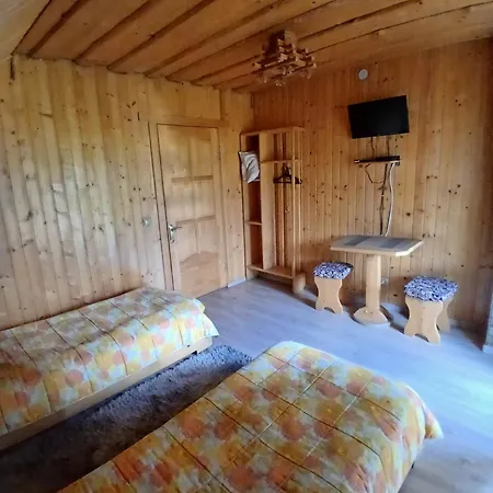 Деревянный коттедж сонячний дім